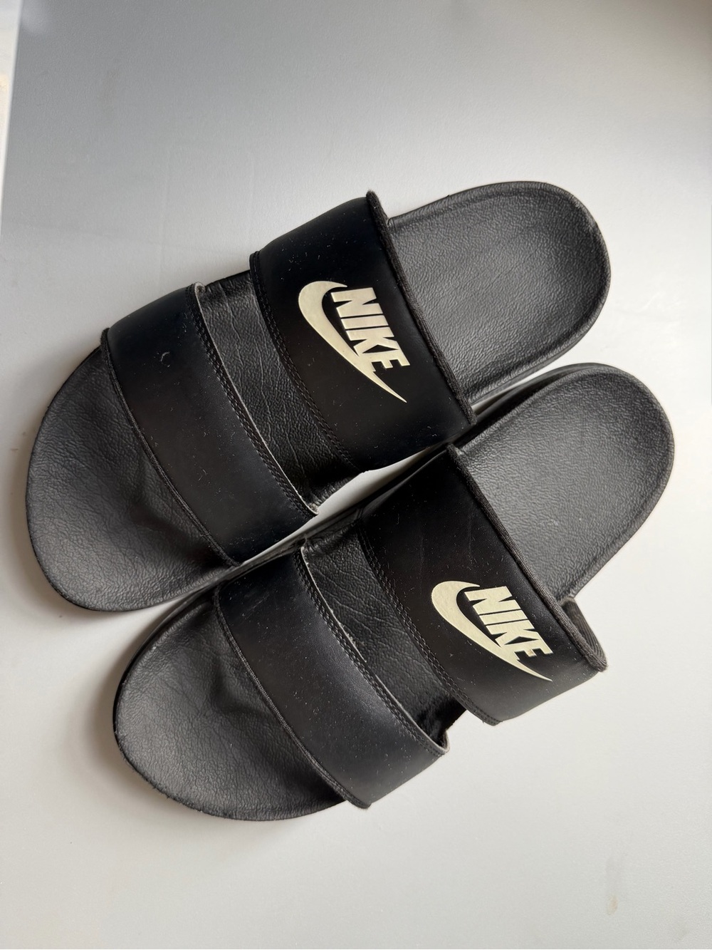 Nike Black Slide Sandals with White Logo Accent